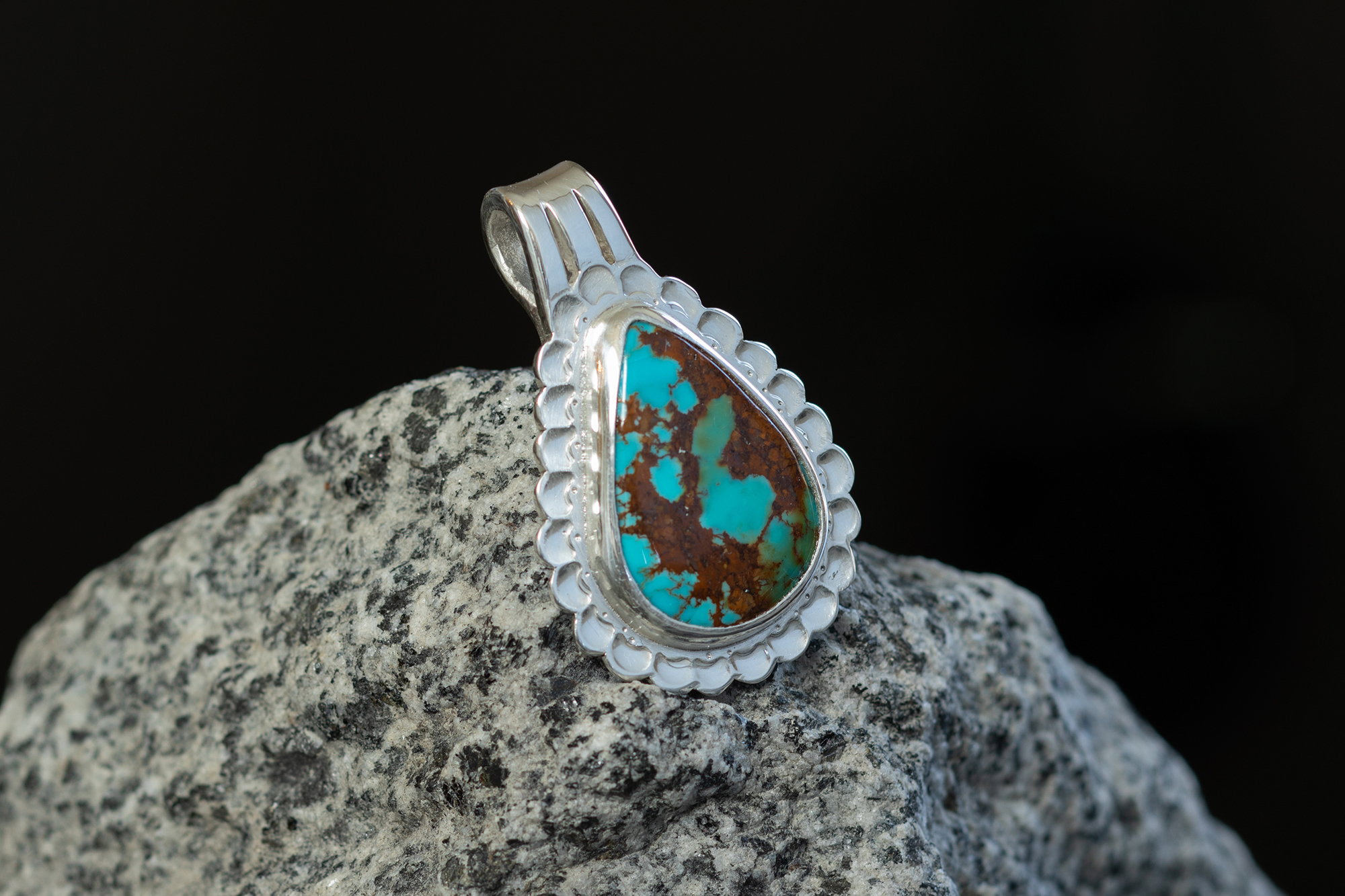 Pendant on rock.